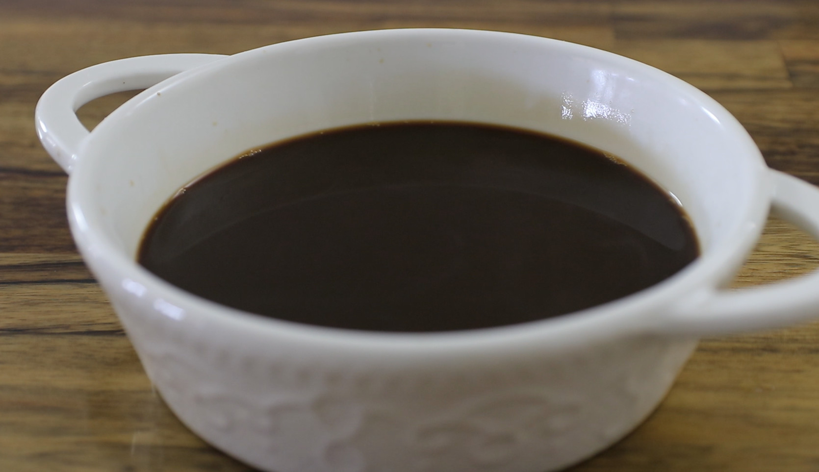 Brew espresso, mix with liqueur (optional), and let it cool in a large dish—perfect for soaking the ladyfingers.