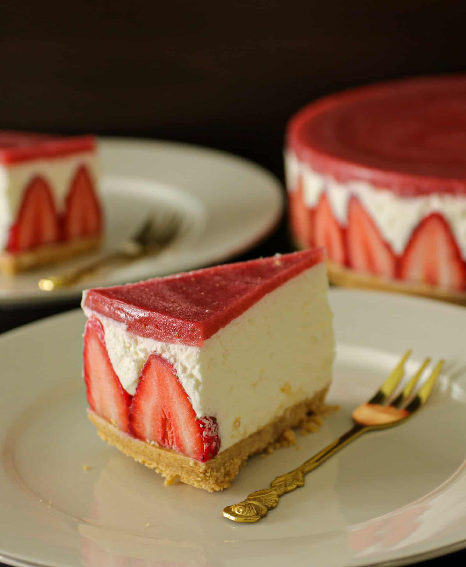 a piece of strawberry layered cheesecake