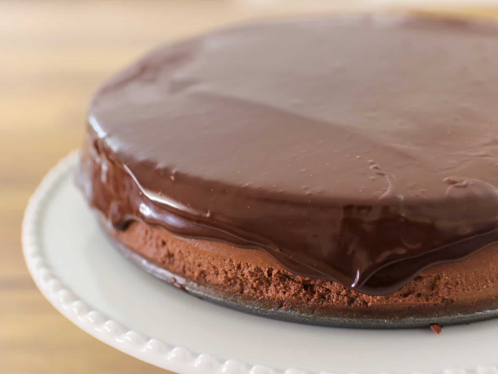 chocolate cheesecake covered with chocolate ganache 