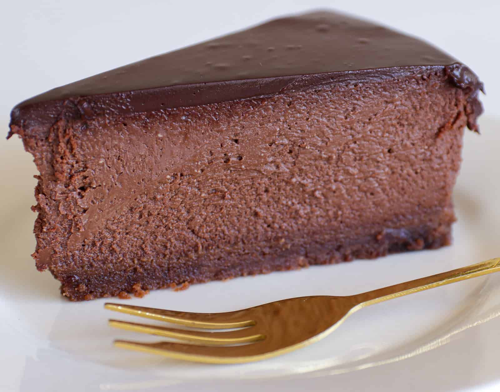 a slice of rich and decadent chocolate cheesecake