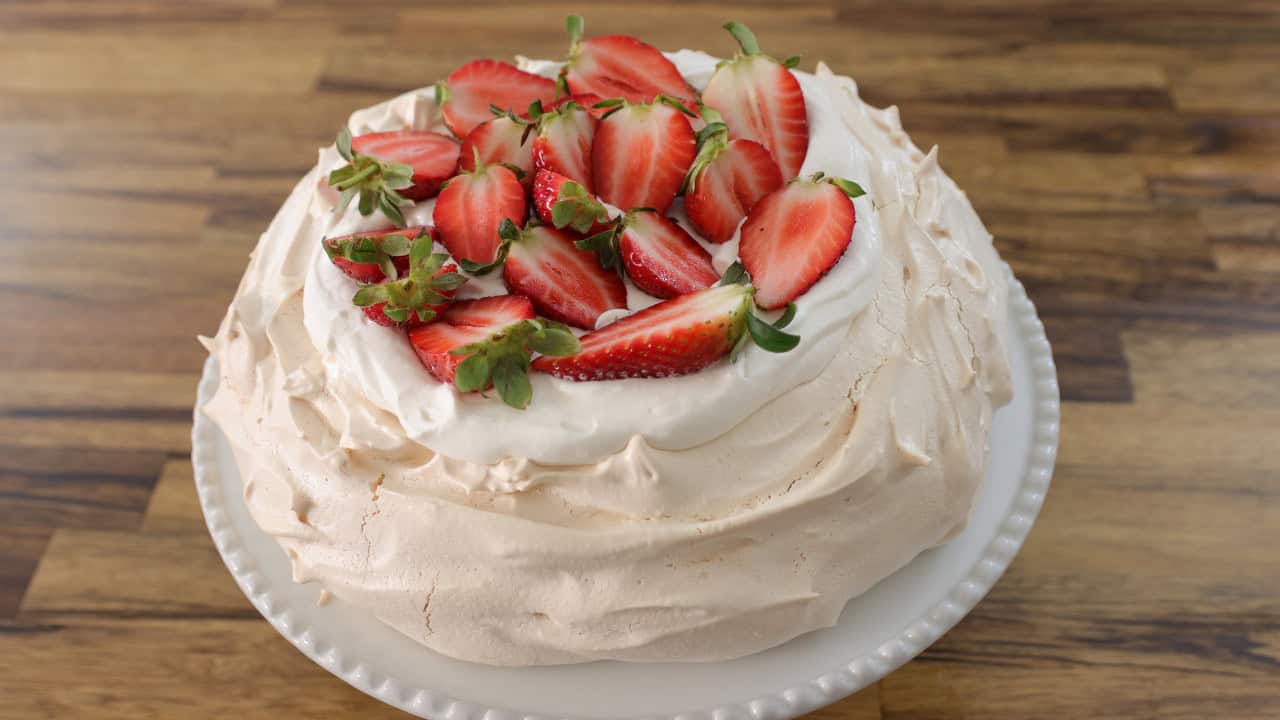 top the pavlova with strawberriesor any fresh fruit