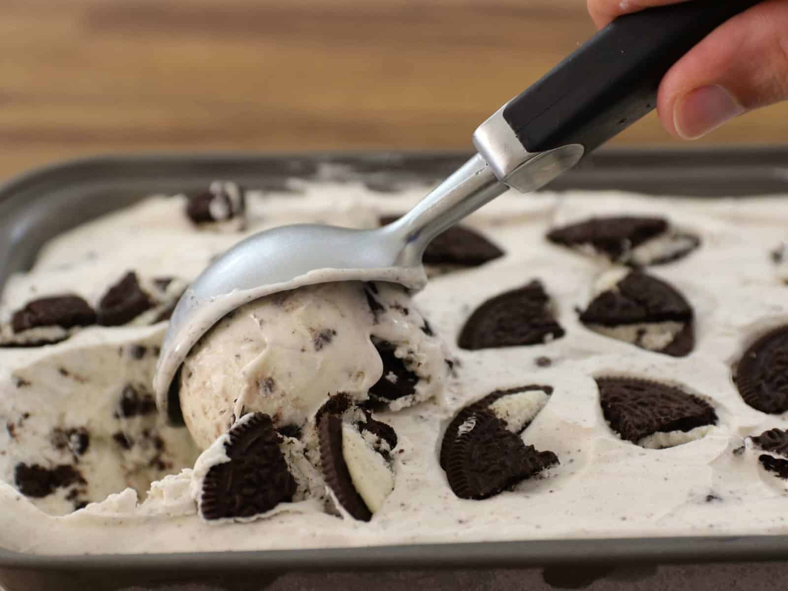 scooping homemade oreo ice cream