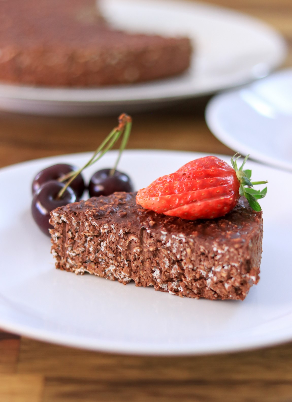 3-ingredient chocolate oatmeal cake  with strawberries on top