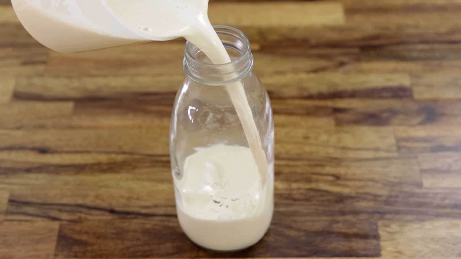 pour creamy eggnog into a bottle 