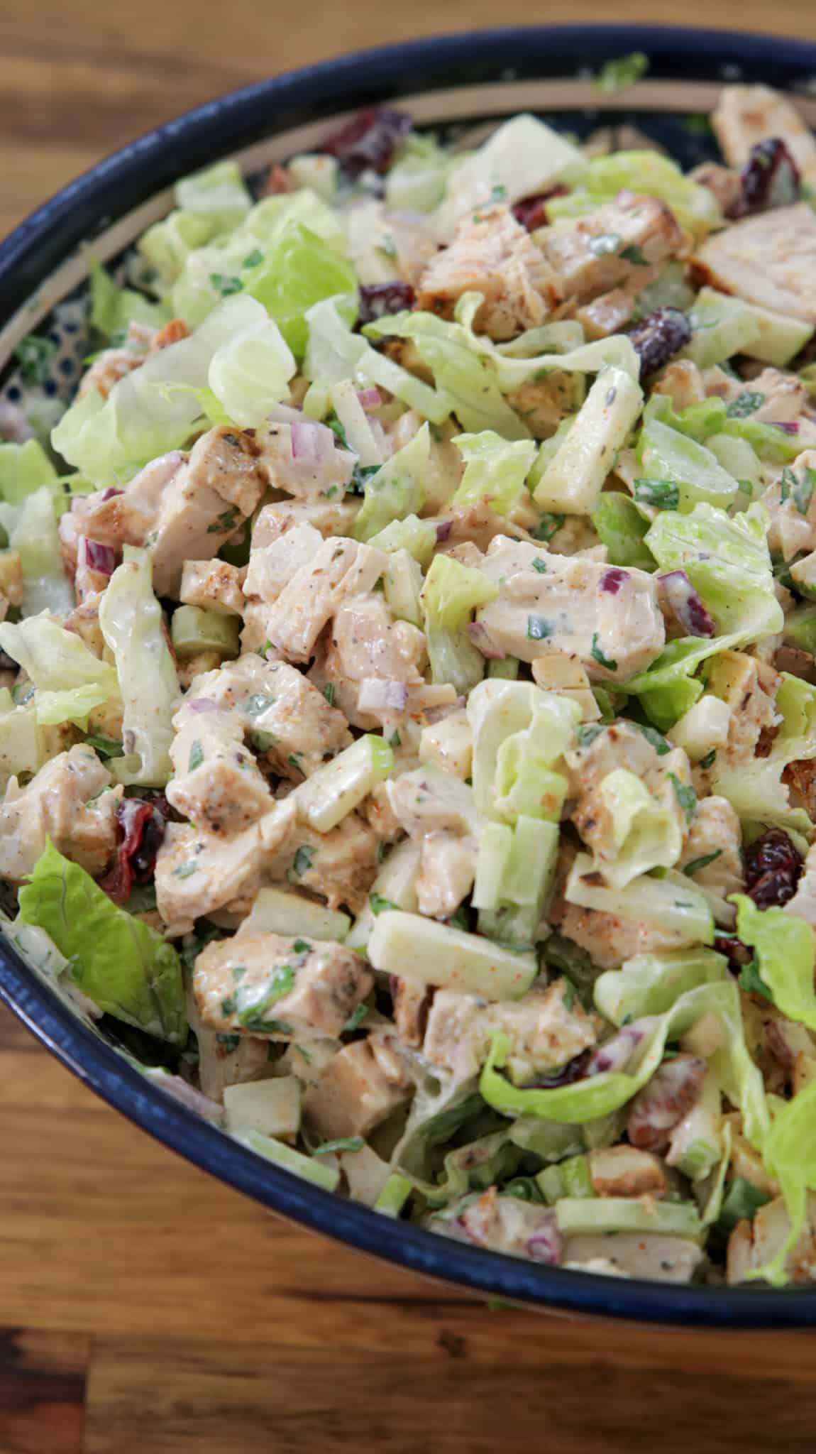 healthy chicken salad with apples, lettuce and vegetables