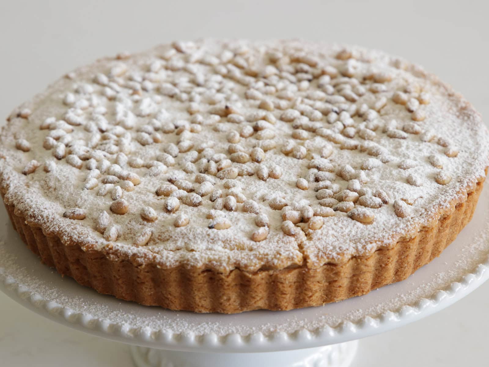 Italian Grandmother's Cake topped with pine nuts