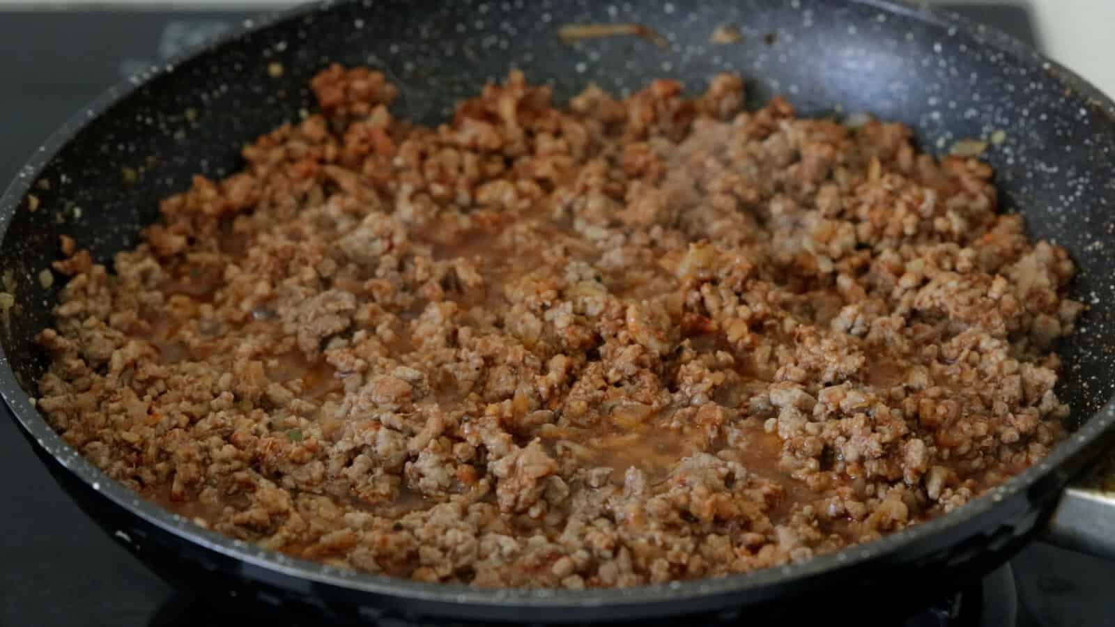 cooking ground beef mixture for the burritos