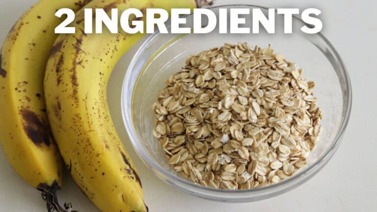 A glass bowl filled with rolled oats is placed beside two ripe bananas on a light-colored surface. The text "2 INGREDIENTS" is displayed at the top.