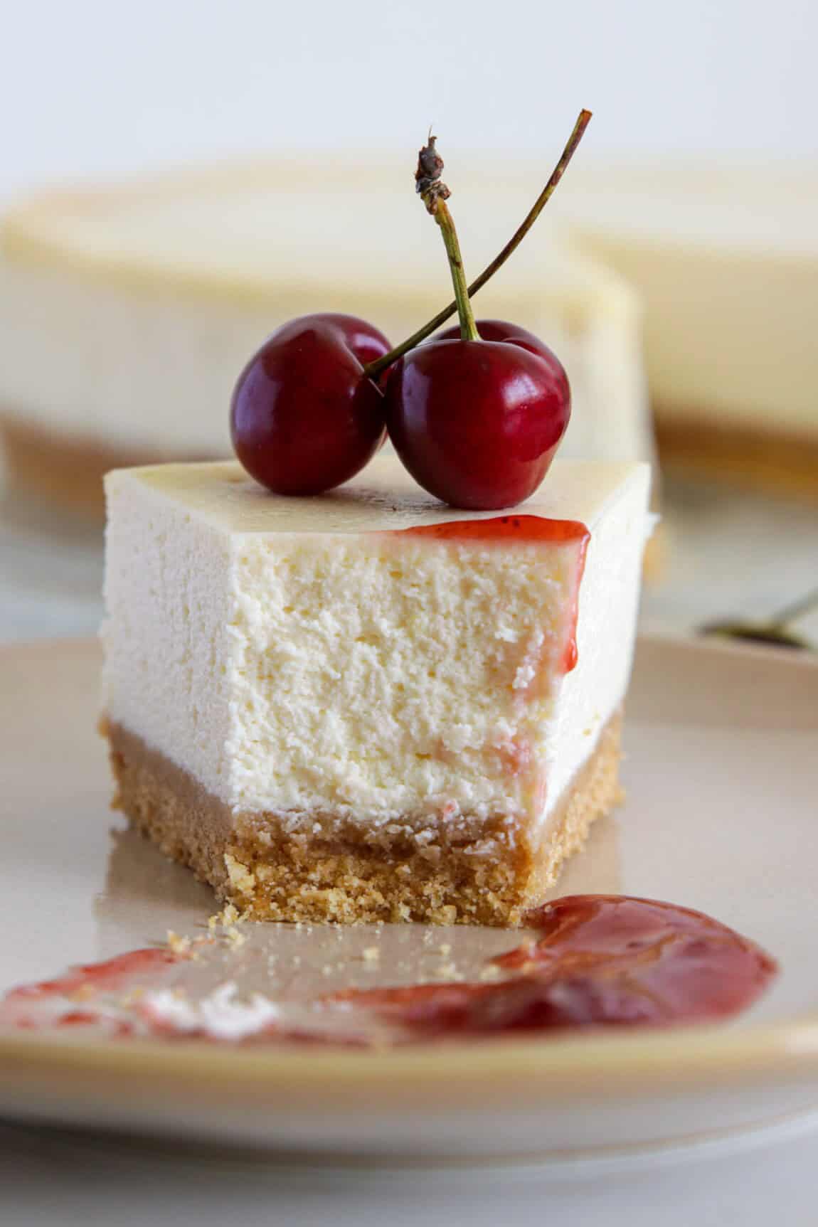 creamy cheesecake with jam and cherries