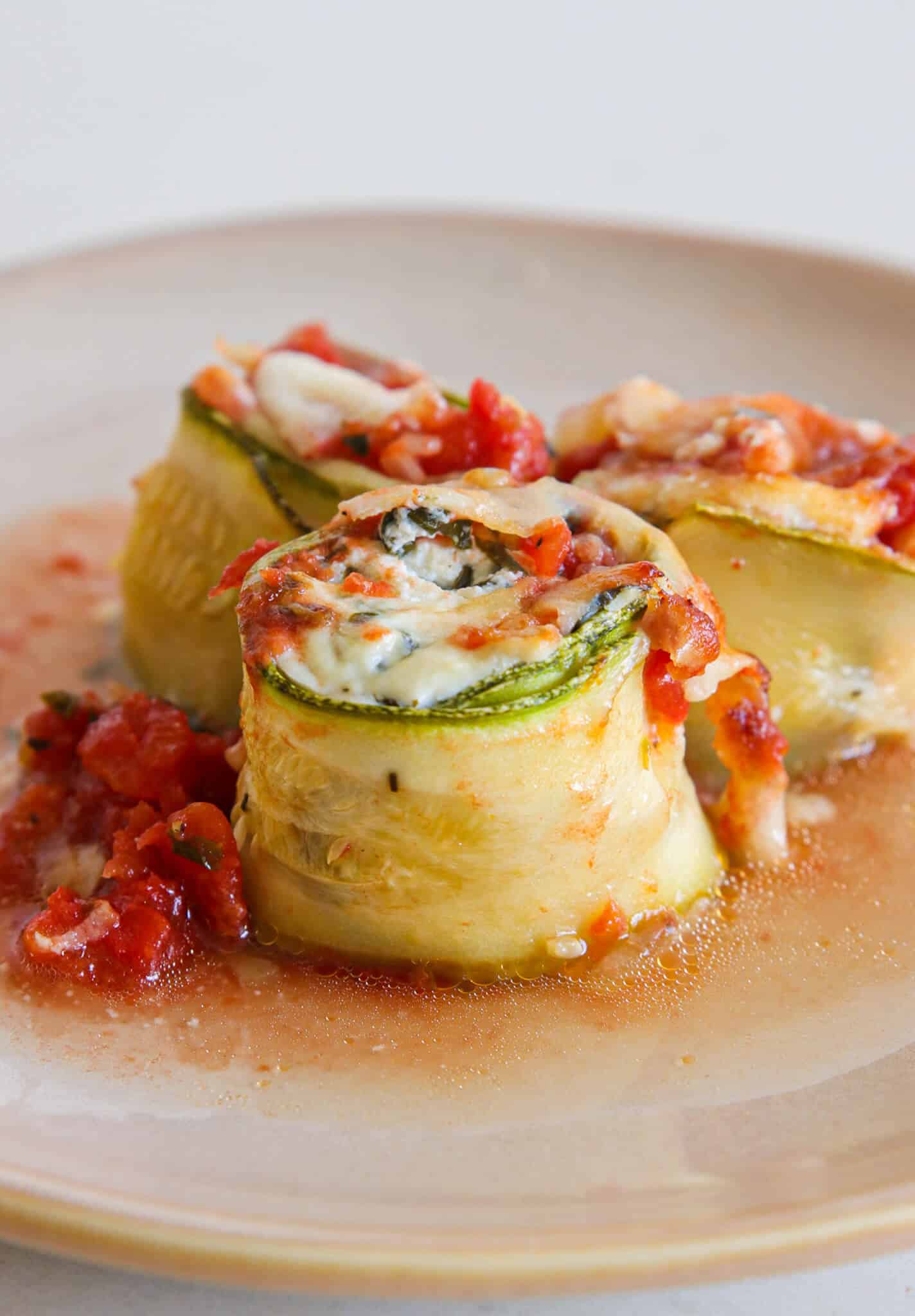 Zucchini Roll Ups with tomato sauce