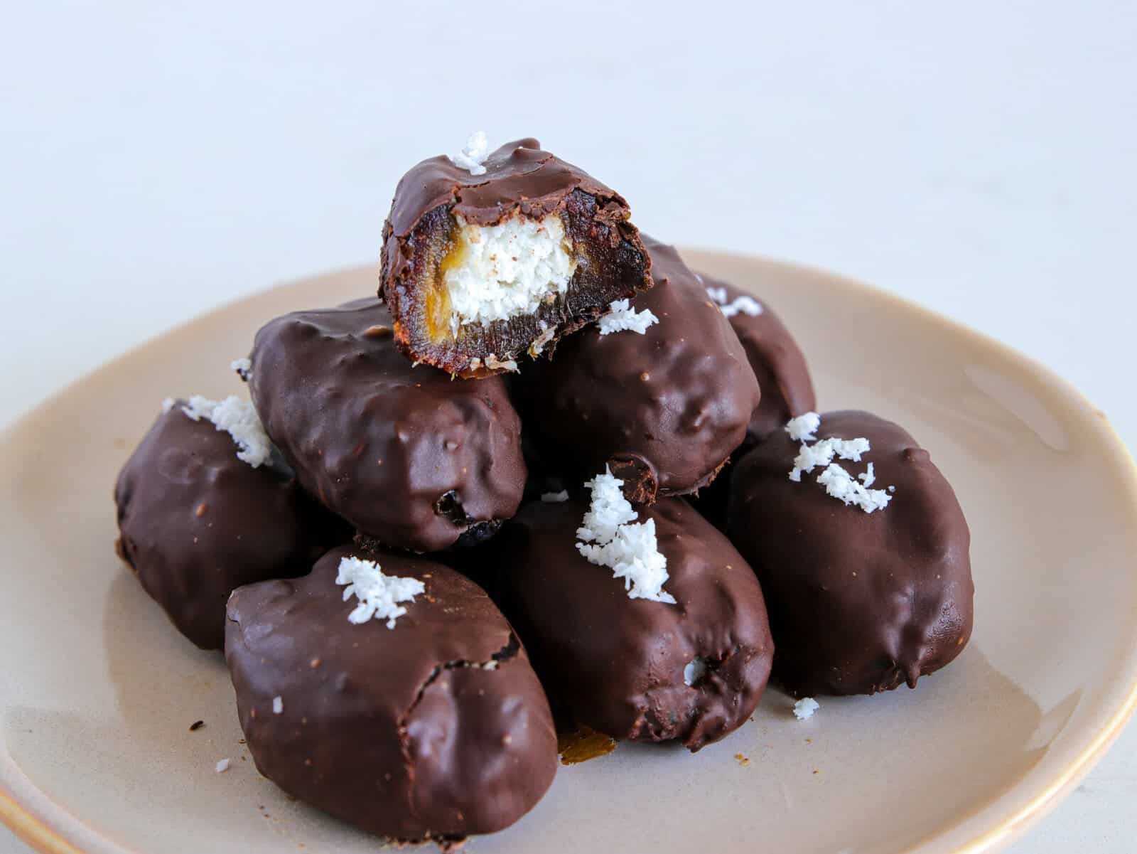 dates stuffed with coconut filling and covered with dark chocolate