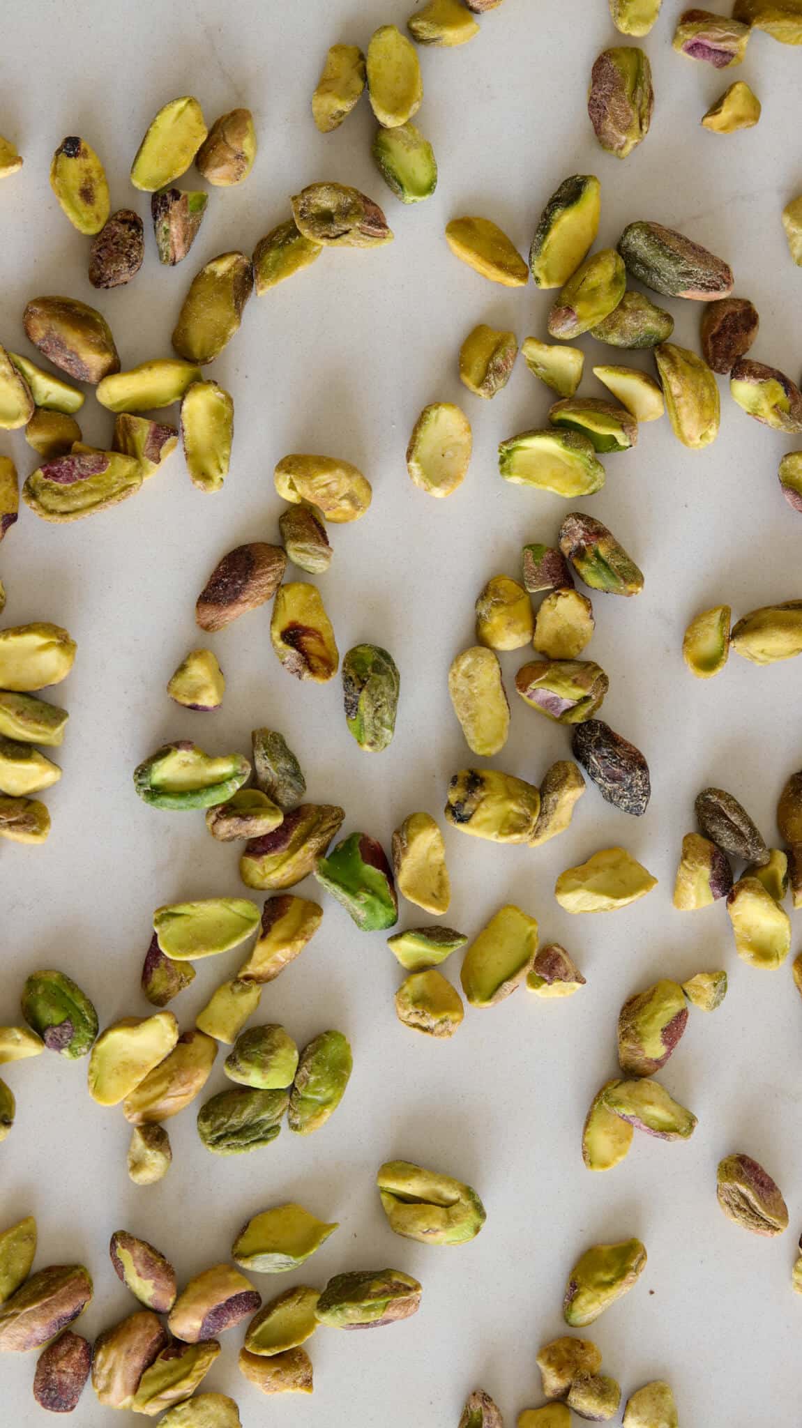 pistachios on a white counter 