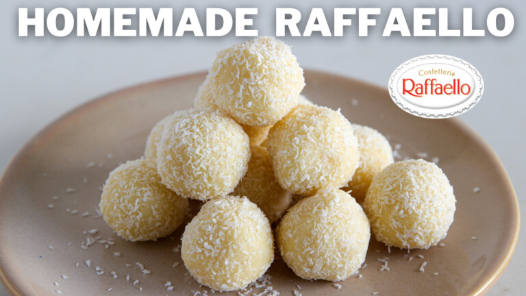 A pyramid of homemade Raffaello truffles sits on a beige plate. The truffles are round, covered in grated coconut, and presented on a light background. The text "HOMEMADE RAFFAELLO" is at the top, with a logo of Raffaello Confections on the right side.