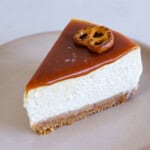 a slice of creamy and delicious salted caramel cheesecake