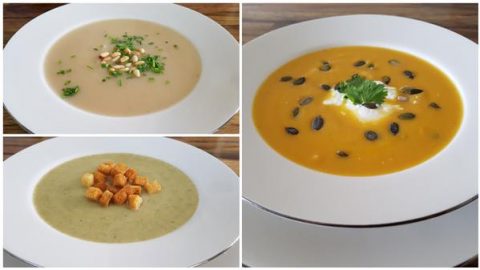 A collage of three bowls of soup. The top left soup is creamy white with pine nuts and herbs. The bottom left soup is light green with croutons. The right soup is orange, garnished with seeds, a dollop of cream, and a sprig of parsley.