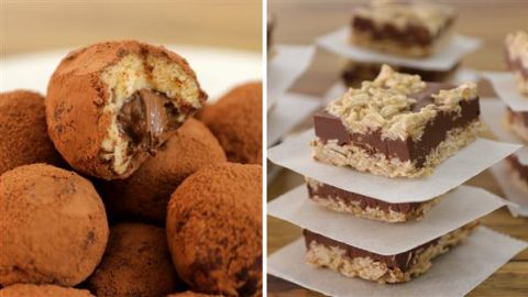 A split image showing two types of desserts. On the left, a stack of cocoa-dusted truffles with one bitten to reveal a gooey chocolate center. On the right, a stack of layered oat and chocolate bars separated by parchment paper.