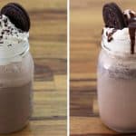 Two mason jar milkshakes sit side by side on a wooden table. Each is topped with whipped cream, an Oreo cookie, and chocolate crumbs. The milkshake on the right also has a drizzle of chocolate syrup over the whipped cream.