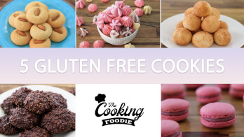 Collage with five types of gluten-free cookies: thumbprint cookies, pink and white meringue cookies in a basket, round sugar-coated cookies, chocolate coconut cookies, and pink macaron cookies. Center text reads “5 Gluten Free Cookies” above "The Cooking Foodie" logo.