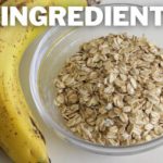 A glass bowl filled with rolled oats is placed beside two ripe bananas on a light-colored surface. The text "2 INGREDIENTS" is displayed at the top.