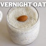 A glass of overnight oats is topped with shredded coconut and an almond. The words "OVERNIGHT OATS" appear above the glass, and a Raffaello logo is positioned to the left.