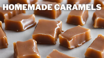 Close-up of several pieces of homemade caramel candies, arranged in neat rows on a flat surface. The caramels have a rich golden-brown color and a glossy, smooth texture. The text "HOMEMADE CARAMELS" is positioned at the top of the image.