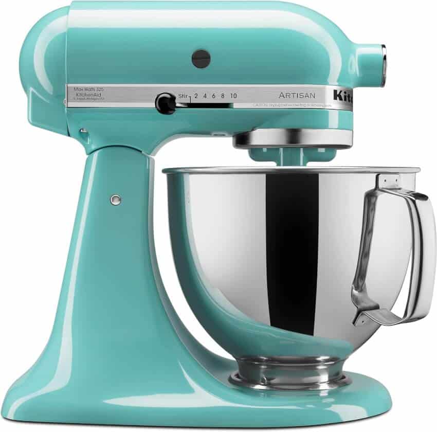 A teal KitchenAid Artisan stand mixer with a stainless steel mixing bowl attached. The mixer features a tilt-head design and a speed control knob ranging from stir to 10.