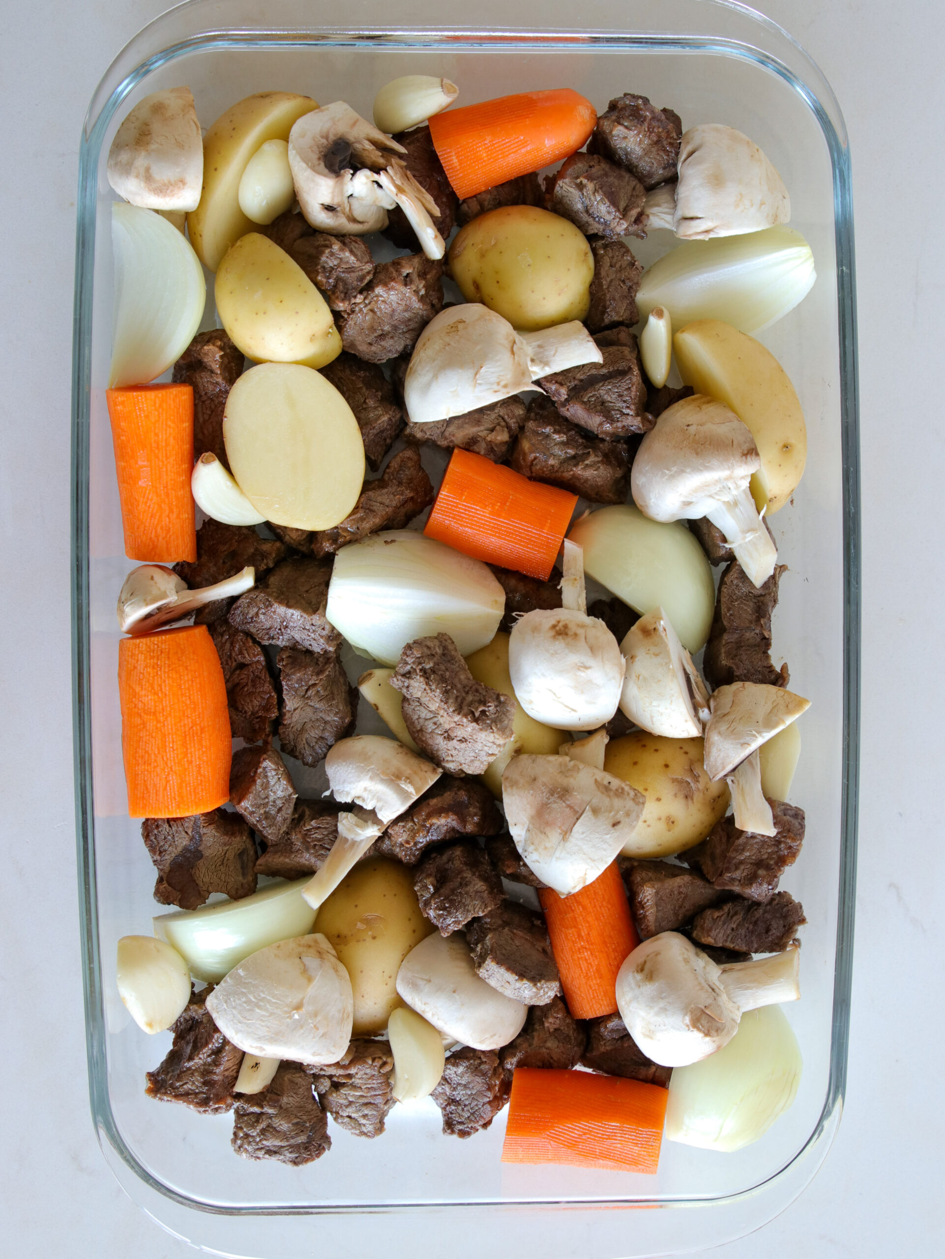 beef and vegetables in baking dish