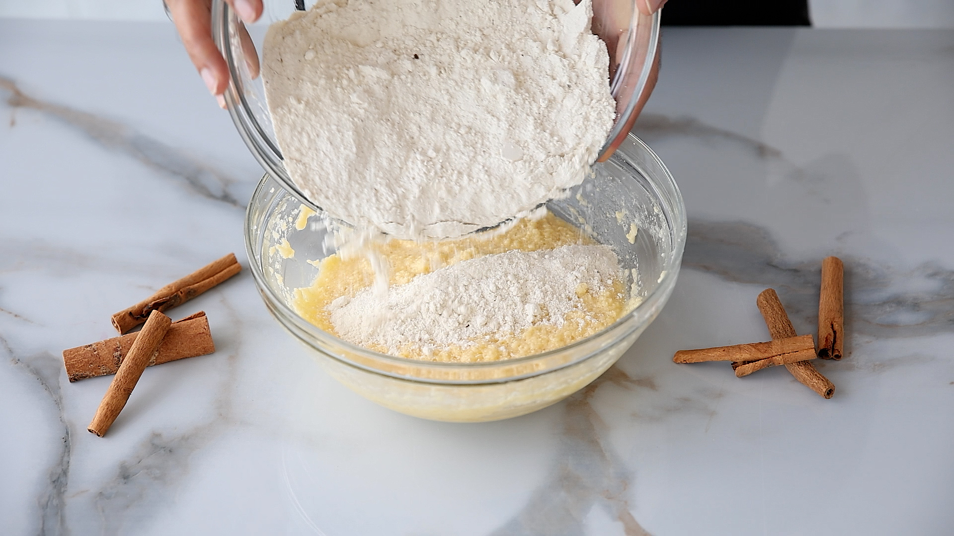 Gradually mix the dry ingredients into the wet until a soft dough forms