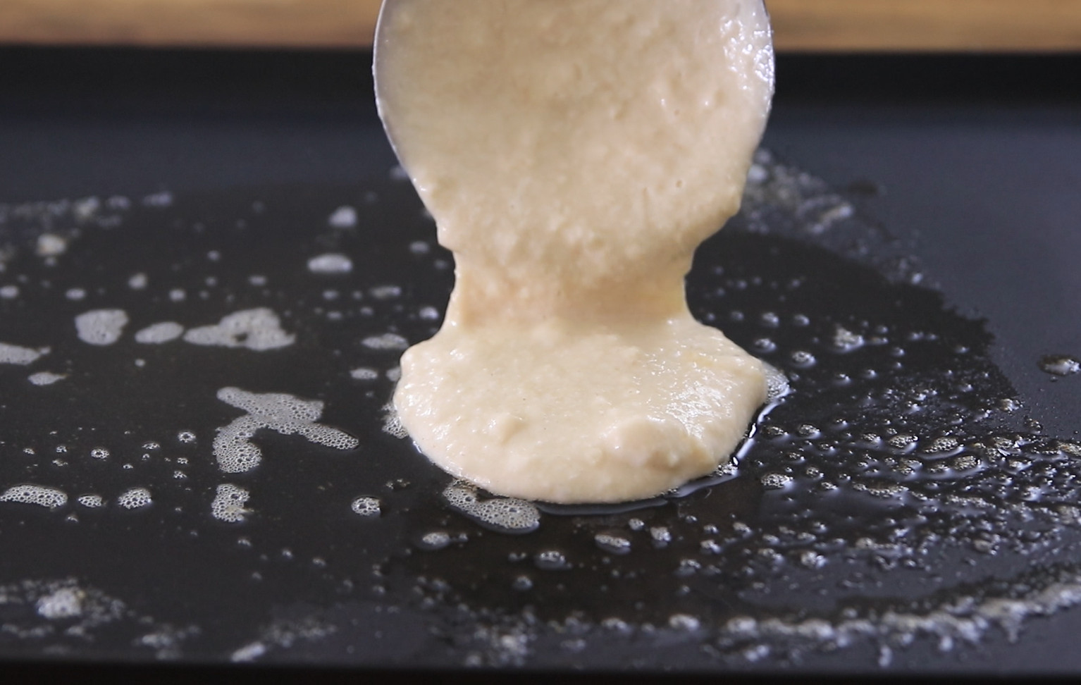 Pour batter onto a hot griddle