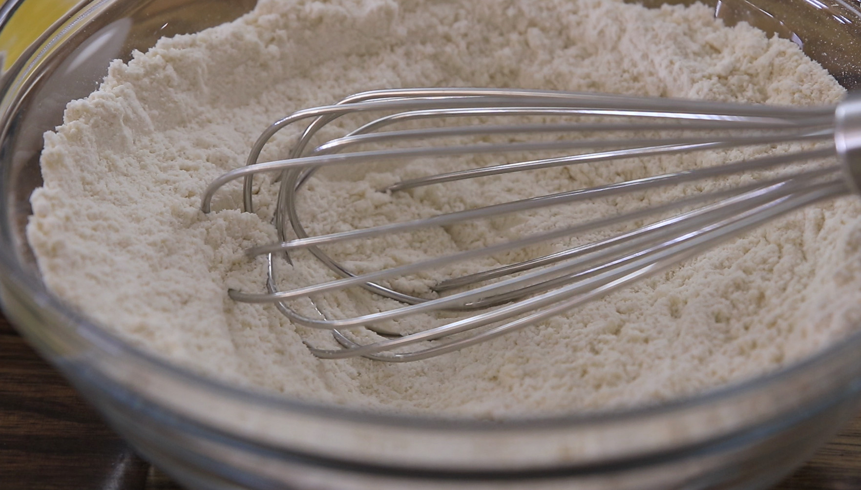 mixing dry ingredients to make pancakes