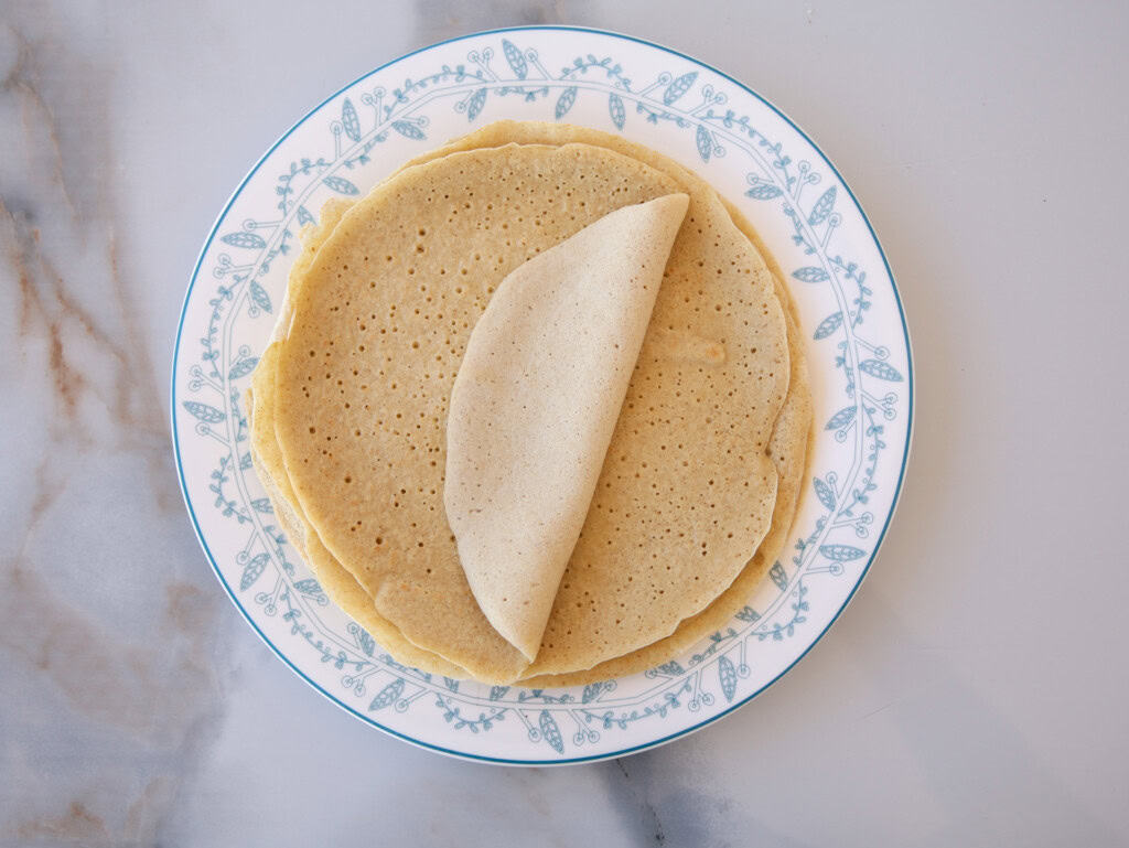 healthy quinoa crepes on a plate.