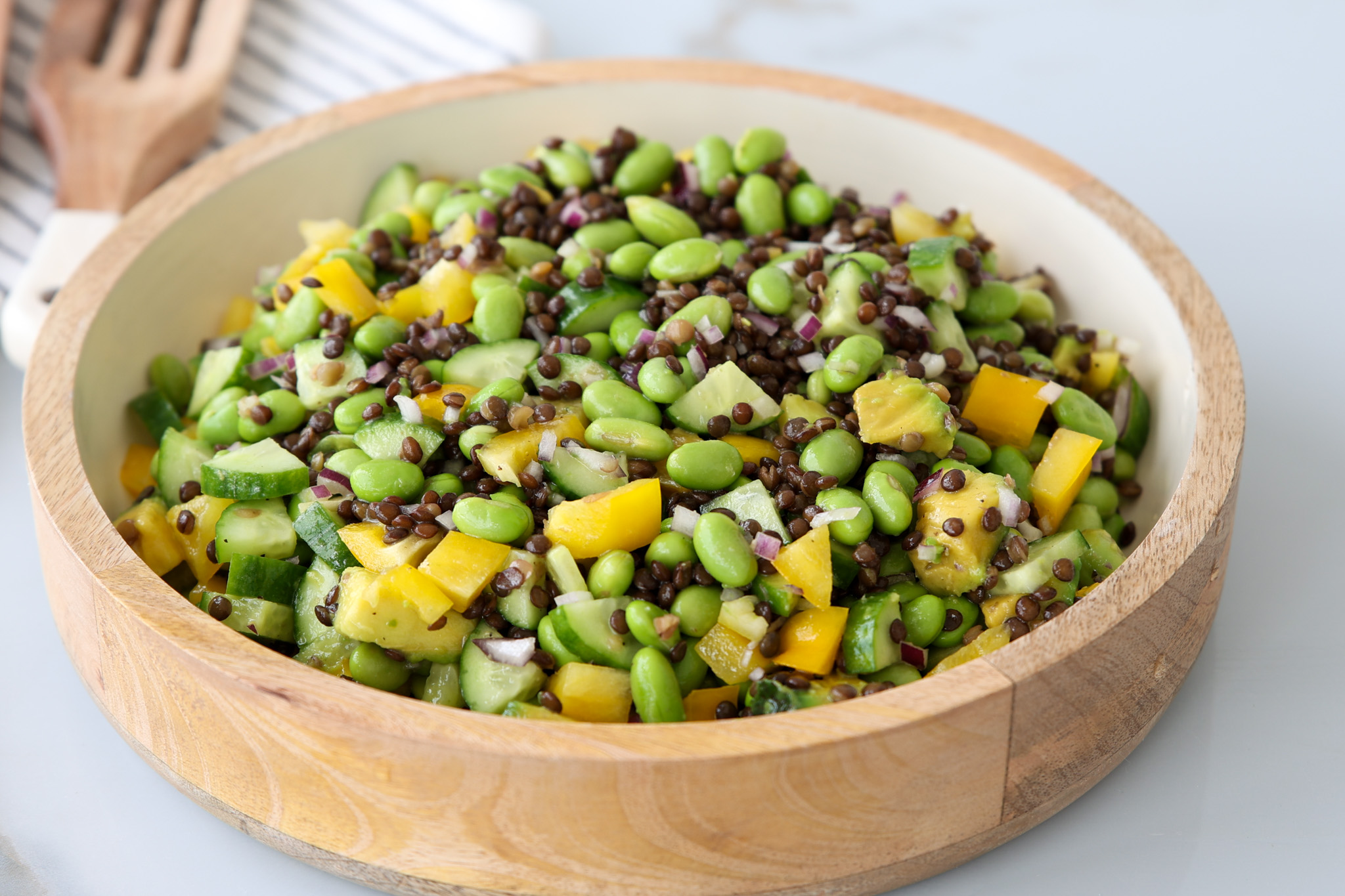 a bowl of colorful salad