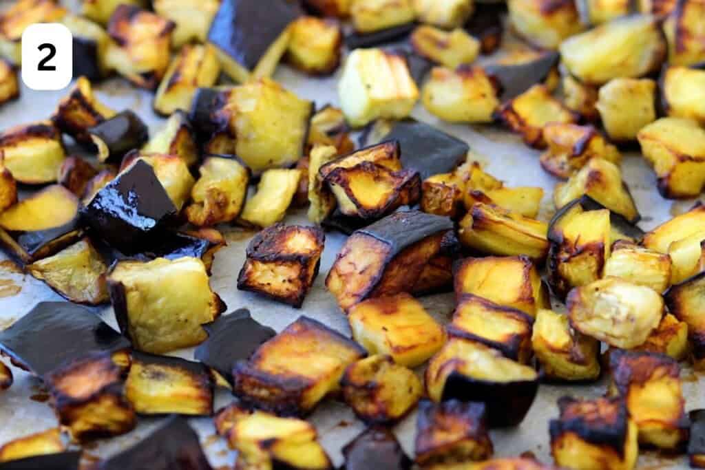 roasted eggplant on a baking sheet.