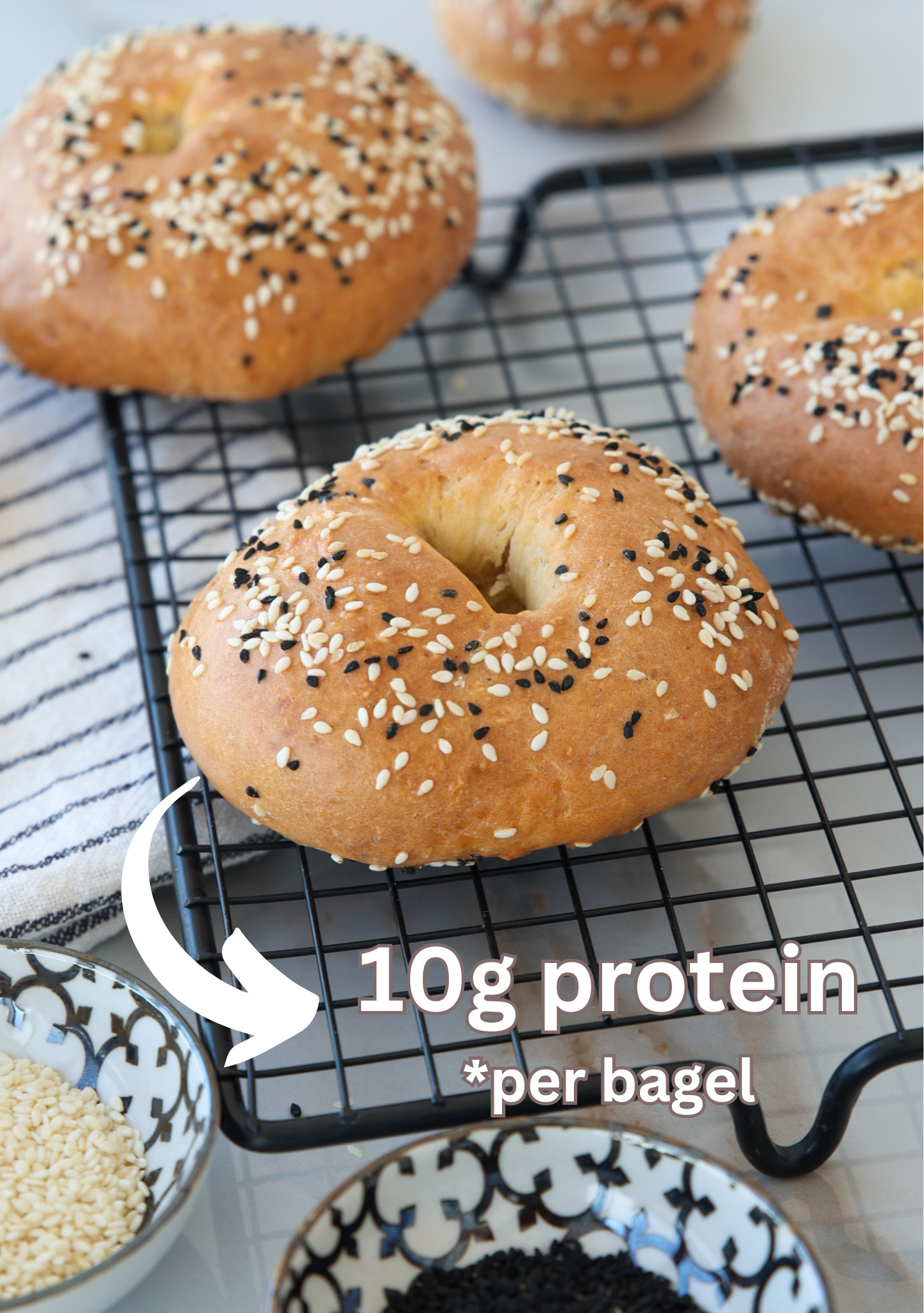 homemade cottage cheese bagels with golden crust and a text says: 10g protein per begel