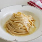 creamy fettuccine alfredo in a white plate