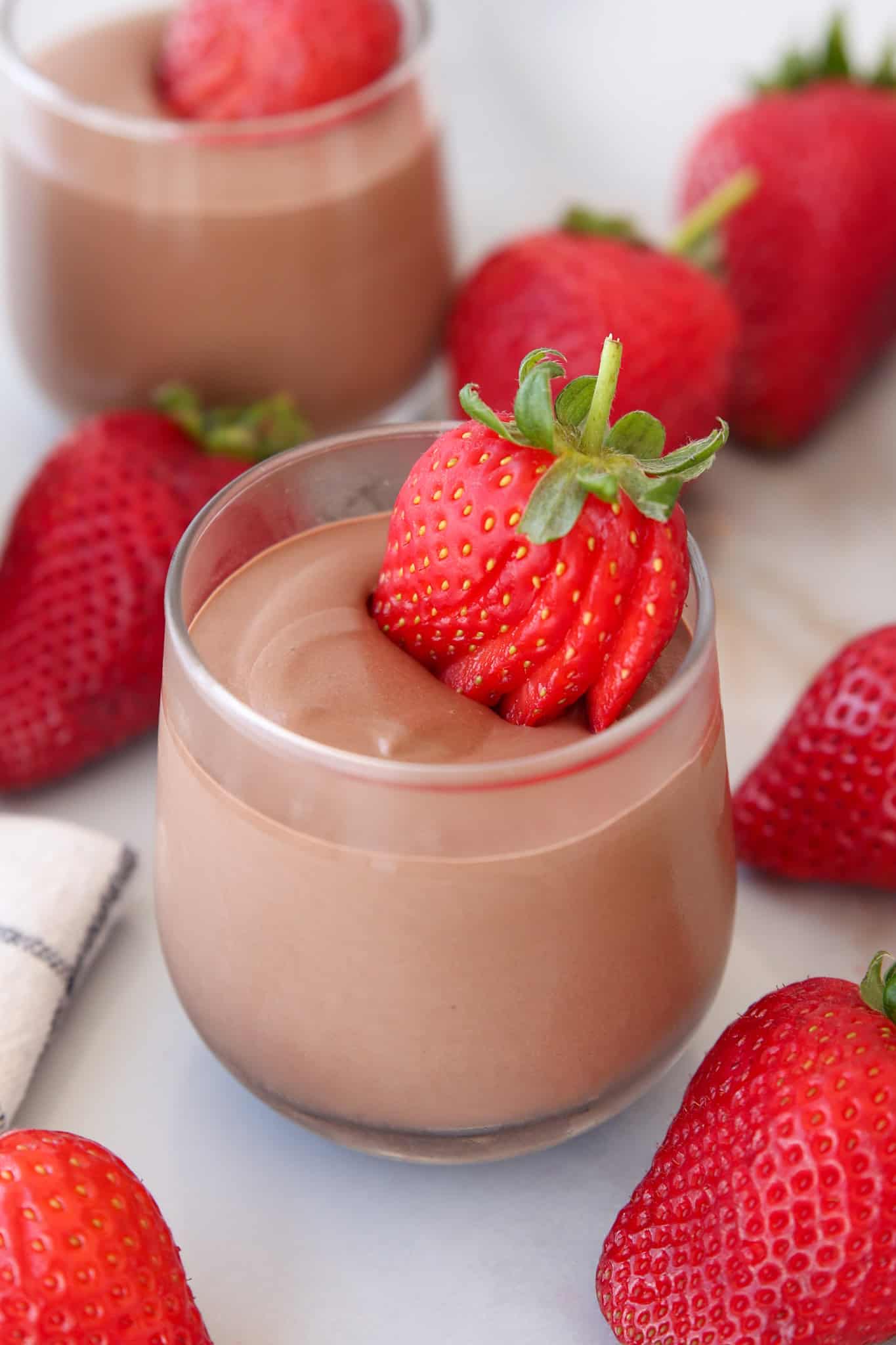 cottage cheese chocolate mousse in a glass served with fresh strawberry