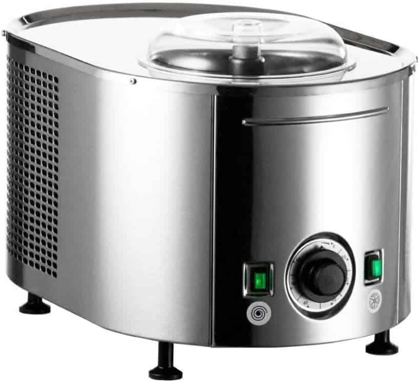 A stainless steel ice cream maker with a transparent lid, green power buttons, a control knob, and black feet, placed on a white background.