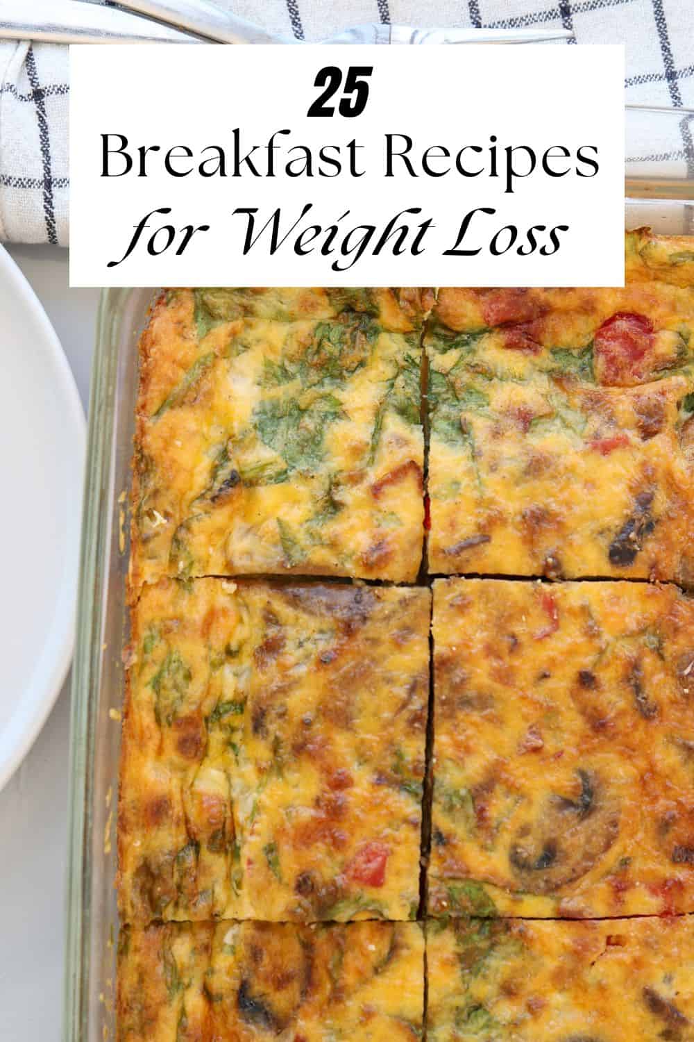A glass baking dish with a sliced vegetable egg casserole. Overlay text reads: "25 Breakfast Recipes for Weight Loss." A white plate and a checkered napkin are partially visible in the background.