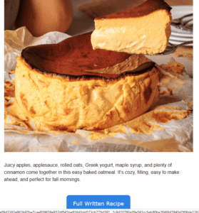 A slice of golden-brown baked oatmeal is being lifted from a larger round portion. The oatmeal has a caramelized top and a soft, textured interior. A pumpkin and apples are visible in the background.